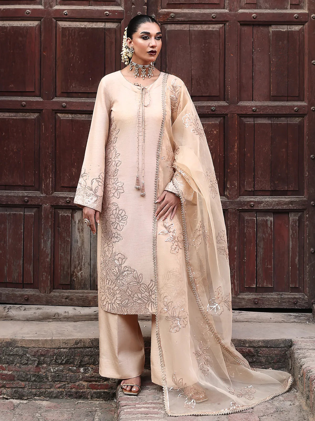 Front full-length view of peach embroidered stitched 3-piece luxury silk suit from Khat by INEJ.