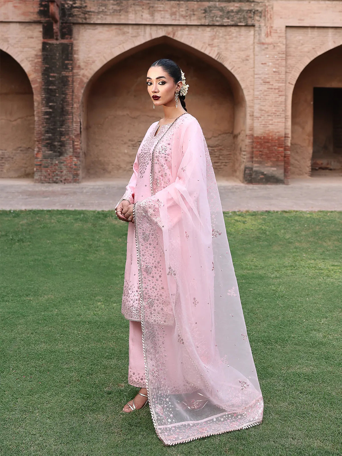 Front full-length view of pink embroidered stitched 3-piece luxury silk suit from Khat by INEJ.