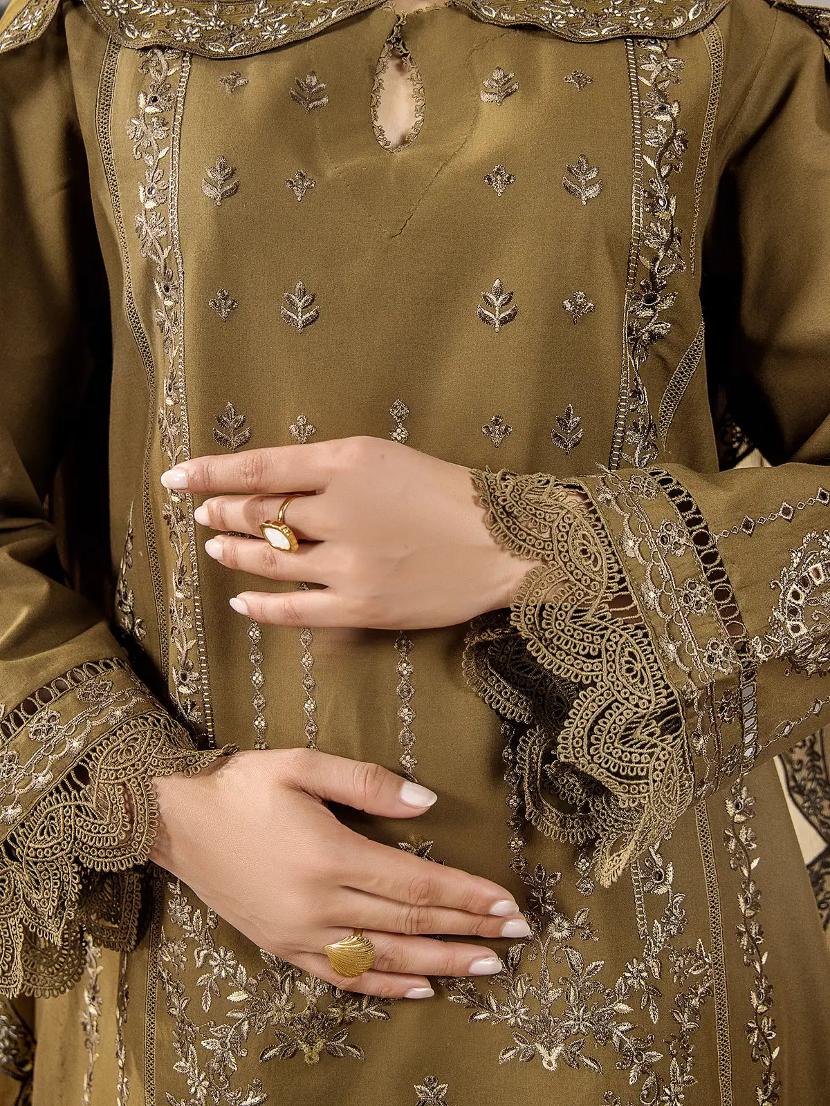 Close-up view of intricate tonal embroidery, keyhole neckline detail, and ornate lace sleeve borders on an olive green lawn suit by INEJ.