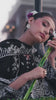 Short video mini reel highlighting close-up details and white floral embroidery on the black suit from the Bad-e-Saba collection by INEJ.