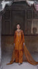 Video reel of a model sitting on a stone pedestal with gajra flowers wearing the Guldozi olive green embroidered suit from the Khat collection by INEJ.