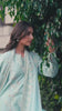 Short video mini reel showing close-up editorial portrait details of the powder blue embroidered suit from the Bad-e-Saba collection by INEJ.