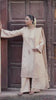 Video reel close-up portrait of a model wearing the Badami cream almond embroidered raw silk suit with pearl choker from the Khat collection by INEJ.