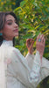 Short video mini reel showcasing walking movement and tailored embroidery of the off-white suit from the Bad-e-Saba collection by INEJ.