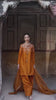 Short video mini reel showcasing golden embellishment detail and draped dupatta on the Guldozi rust embroidered suit from the Khat collection by INEJ.